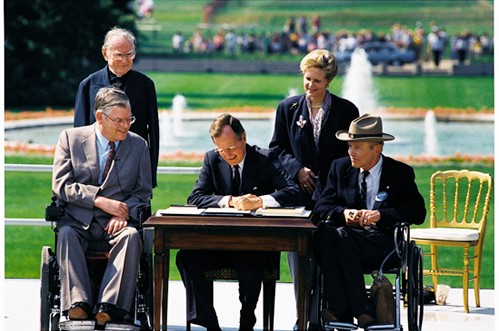 Image of President Lyndon Johnson signing the Americans with Disabilities Act