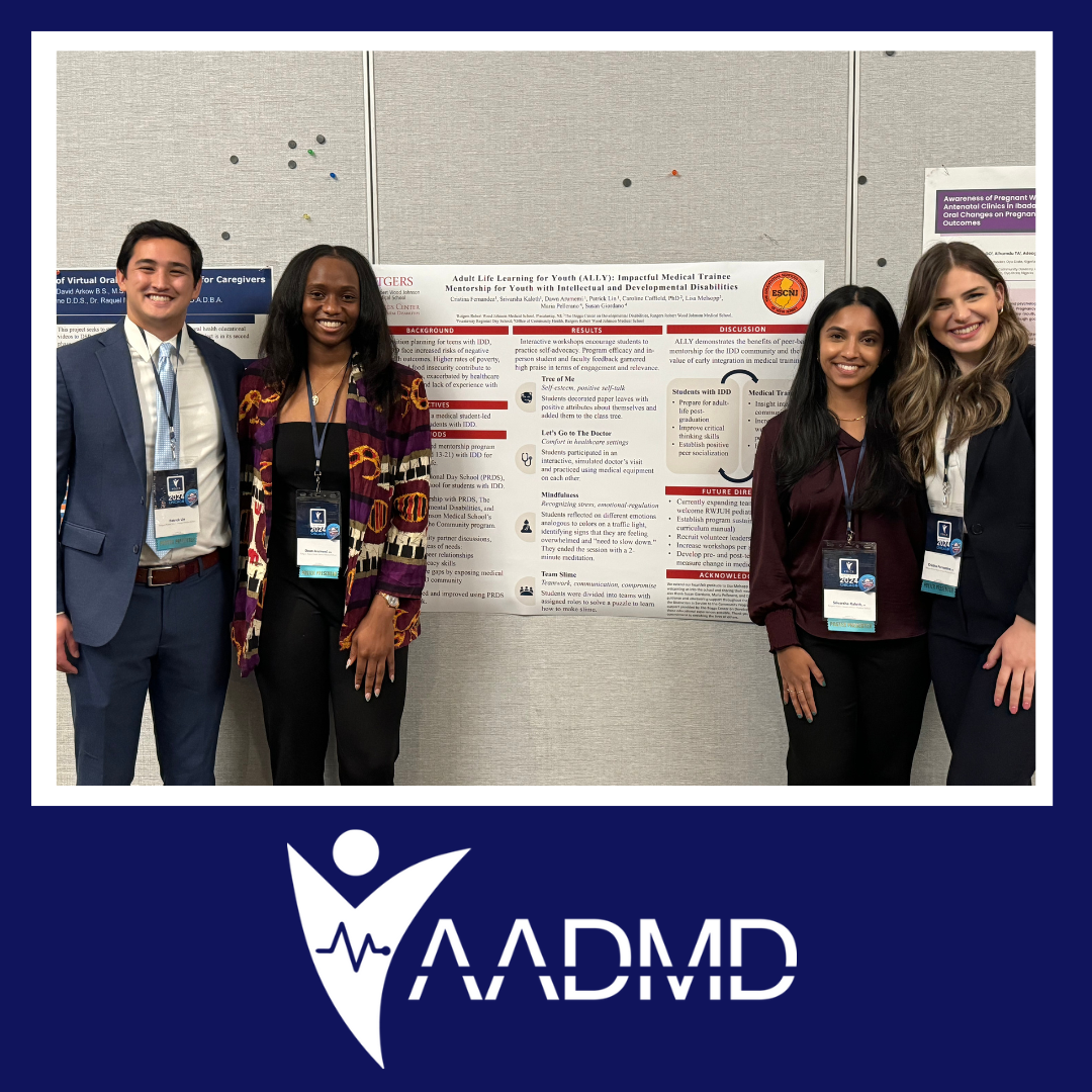 Students standing in front of their research poster